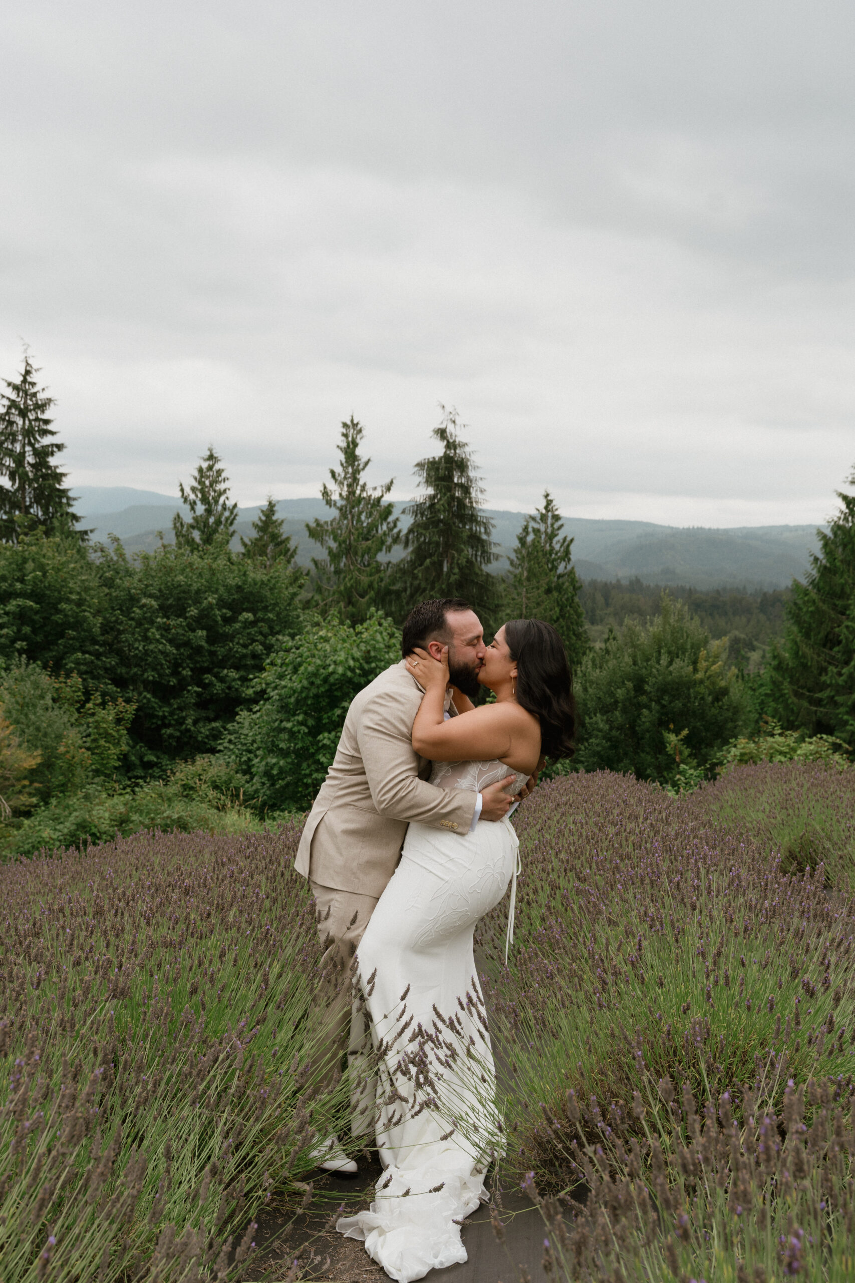 ride and groom sharing a first look in a lavender field during their Washington backyard wedding.